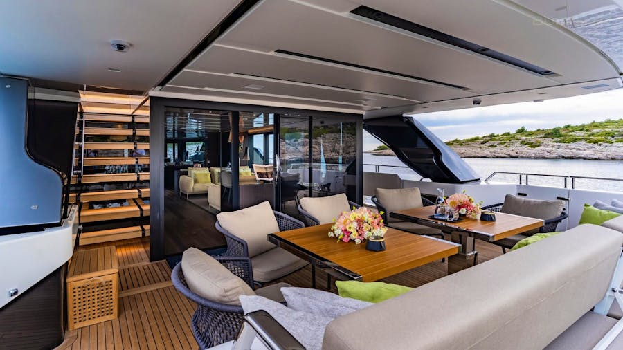 Comfortable aft deck lounge, main deck master, private foredeck lounge, outside cushions, and sun pads for generous sunbathing areas
